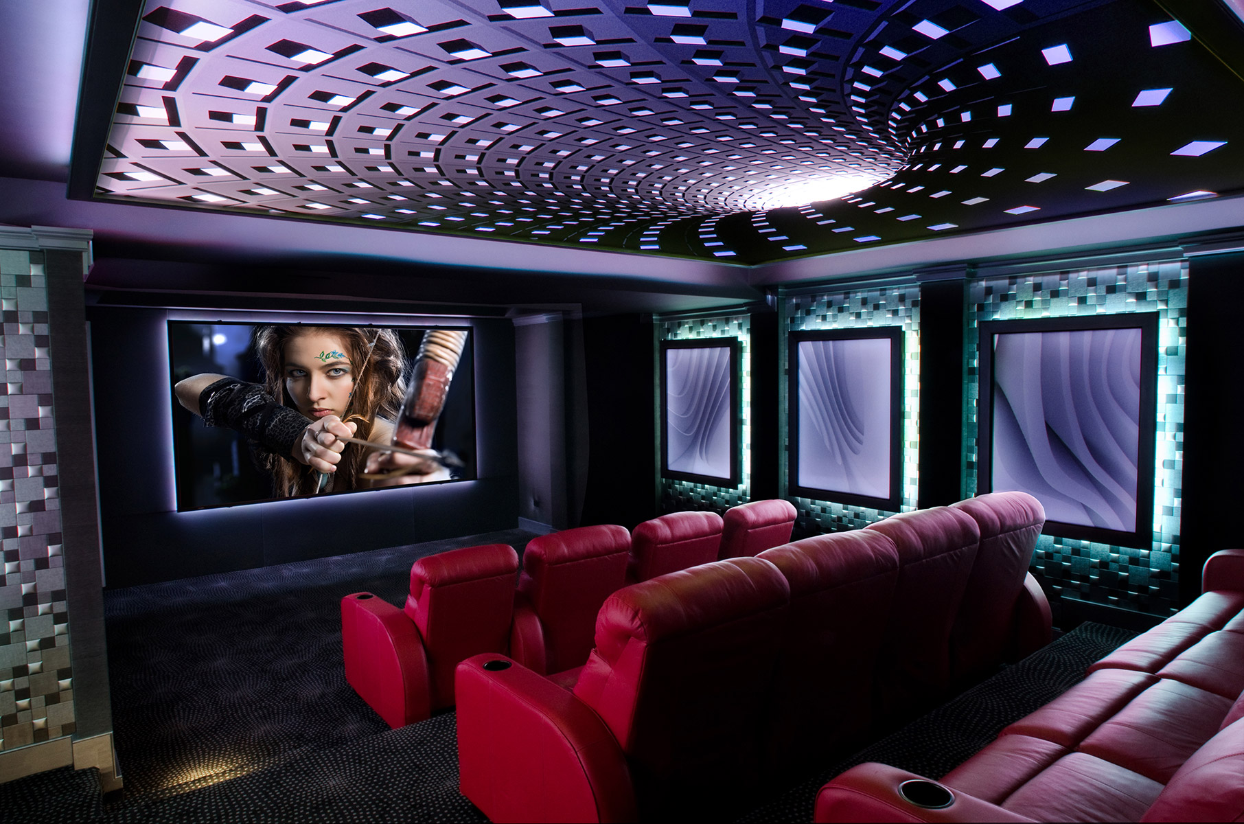 Luxury home theater with red seating and spectacular ceiling design